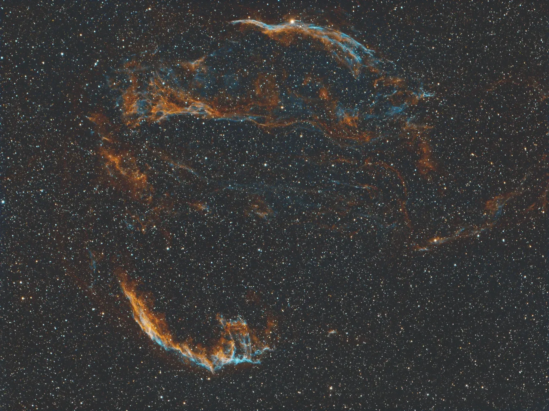  The Veil Nebula, which is a supernova remnant. Its circular shape is the expanding gas from a star’s explosion. Pretty cool. This was a quick shot, just three hours each of Hydrogen Alpha and Oxygen III filters. 
