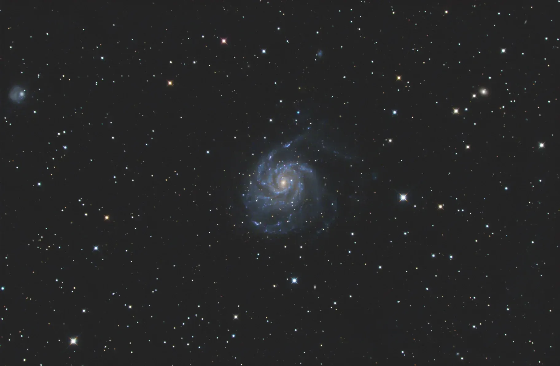  The wider field of view captured with the ZWO ASI071MC-Pro for 9.5 hours. 