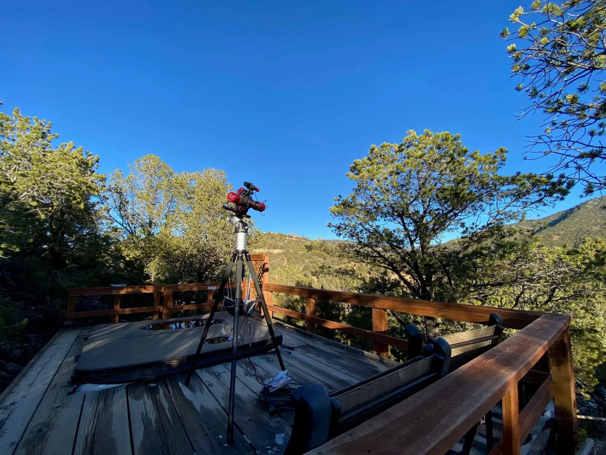 Remote astrophotography with a portable setup: traveling to a dark site